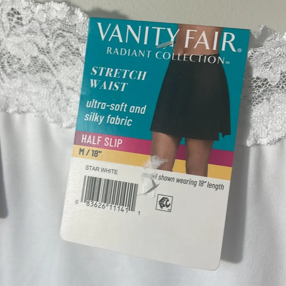 Nwt vanity fair half slip in white, size m 18” length can be adjusted.